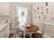 Charming breakfast nook with a round wooden table and natural light at 536 Carroll St, Statesville, NC 28625