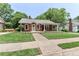 Charming brick home with a welcoming front porch and manicured lawn at 536 Carroll St, Statesville, NC 28625