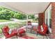 Inviting front porch with comfortable seating and a view of the neighborhood at 536 Carroll St, Statesville, NC 28625