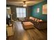 Inviting living room with comfortable seating, natural light, and modern decor at 571 Goldstaff Ln, Charlotte, NC 28273