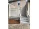 Small backyard patio featuring privacy fence and wooden steps at 571 Goldstaff Ln, Charlotte, NC 28273