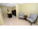 Basement sitting area with chairs and a wine rack at 6302 Dwayne Starnes Dr, Hickory, NC 28602