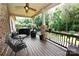 Outdoor patio space featuring a ceiling fan, table, chairs, and a grill at 6302 Dwayne Starnes Dr, Hickory, NC 28602