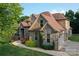 Beautiful brick and stone home with a well-manicured lawn and attached two car garage at 6302 Dwayne Starnes Dr, Hickory, NC 28602