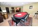 Finished basement game room with a bar area, poker table, and stylish decor at 6302 Dwayne Starnes Dr, Hickory, NC 28602