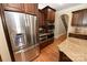 Kitchen featuring modern stainless steel appliances, wood cabinets, and granite countertops at 6302 Dwayne Starnes Dr, Hickory, NC 28602
