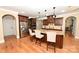 Well-equipped kitchen with stainless steel appliances, a granite island, and seamless connection to other areas at 6302 Dwayne Starnes Dr, Hickory, NC 28602