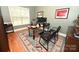 Well-lit office with a modern desk, comfortable chairs, and a serene workspace environment at 6302 Dwayne Starnes Dr, Hickory, NC 28602