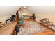 Spacious office area with hardwood flooring, unique rug, and ample space for work at 6302 Dwayne Starnes Dr, Hickory, NC 28602
