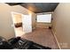 Home theater room setup with a large screen, comfortable seating, and surround sound speakers at 6302 Dwayne Starnes Dr, Hickory, NC 28602