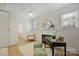 Bright space features a modern desk, fireplace, and ample storage at 6938 Wrentree Dr, Charlotte, NC 28210