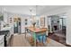 Bright kitchen with an island, wood top island, stainless steel appliances and ample counter space at 6946 Woodstock Dr, Charlotte, NC 28210