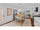 Well-appointed kitchen features stainless appliances, wood island, and seamless access to the living spaces at 6946 Woodstock Dr, Charlotte, NC 28210