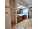 Spacious bathroom with patterned floors, double sink vanity, and shower/tub for comfort and convenience at 695 Knollcrest Ne Dr, Concord, NC 28025