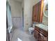 Bathroom featuring tile flooring, a wood vanity, and glass shower at 695 Knollcrest Ne Dr, Concord, NC 28025