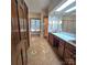 Bathroom featuring double vanity, and decorative tile at 695 Knollcrest Ne Dr, Concord, NC 28025