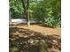 Beautiful landscaping featuring hydrangeas, mulch beds and stone border at 695 Knollcrest Ne Dr, Concord, NC 28025