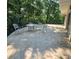 Outdoor patio with tile flooring and furniture set, perfect for relaxing or entertaining guests at 695 Knollcrest Ne Dr, Concord, NC 28025