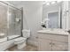 Well-maintained bathroom with walk-in shower, tub, and updated vanity at 705 Congressional Ln, Fort Mill, SC 29708
