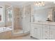 Bright bathroom featuring a walk-in shower, tub, double sink vanity, and tile flooring at 705 Congressional Ln, Fort Mill, SC 29708