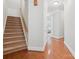 Hallway featuring a staircase with wood and carpeted steps at 705 Congressional Ln, Fort Mill, SC 29708