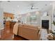 Open concept living room with a fireplace, kitchen, and an eat-in area at 705 Congressional Ln, Fort Mill, SC 29708