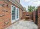 This secluded brick-lined patio features a grilling area and concrete pavers at 705 Congressional Ln, Fort Mill, SC 29708