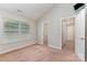 Bright bedroom featuring a neutral carpet, sloped ceiling, and closet at 7121 Bidford Ct, Indian Land, SC 29707