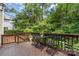 Wooden deck with table and chairs, perfect for outdoor enjoyment at 7121 Bidford Ct, Indian Land, SC 29707