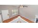 View of the foyer showing the front door, stairs, hardwood flooring, and fireplace at 7121 Bidford Ct, Indian Land, SC 29707