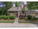 Charming two-story home featuring a well-maintained lawn with lush landscaping and a welcoming front entrance at 7121 Bidford Ct, Indian Land, SC 29707