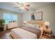 A staged bedroom boasts a neutral color palette, modern furniture, and ample natural light at 7320 Ritter Dr, Charlotte, NC 28270