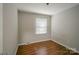 Bedroom with wood floors and window at 7320 Ritter Dr, Charlotte, NC 28270