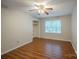 Well-lit bedroom with hardwood floors, and window with blind at 7320 Ritter Dr, Charlotte, NC 28270