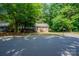 Charming single-Gathering home with a manicured lawn and blue shutters that enhance its curb appeal at 7320 Ritter Dr, Charlotte, NC 28270