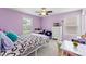 Bedroom with natural lighting, desk, and ceiling fan at 7798 Sand Trap Ln, Stanley, NC 28164