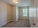 Comfortable bedroom featuring a window for natural light at 8226 Gabon Ct, Charlotte, NC 28215