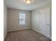 Cozy bedroom featuring a neutral color palette and window at 8226 Gabon Ct, Charlotte, NC 28215