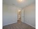 Neutral bedroom with view to the en-suite bathroom at 8226 Gabon Ct, Charlotte, NC 28215