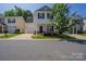 Charming two-story home with black shutters, attached garage, and a well-maintained lawn at 8226 Gabon Ct, Charlotte, NC 28215