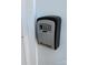 Image shows a Primary Lock lockbox used for property access at 8226 Gabon Ct, Charlotte, NC 28215