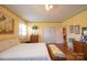 Cozy bedroom with hardwood floors, an ensuite bathroom, and ample closet space at 100 S Rudisill Ave, Cherryville, NC 28021