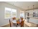 Bright kitchen with stainless steel appliances, kitchen island, and an adjacent dining area at 1028 Grays Mill Rd, Charlotte, NC 28215