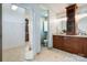 Bathroom with double sink vanity, granite counters and enclosed closet at 10927 Thornhill Club Dr, Charlotte, NC 28277