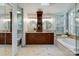 Spacious bathroom with dual vanities and large soaking tub at 10927 Thornhill Club Dr, Charlotte, NC 28277