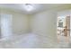 Bedroom with neutral carpet and staircase view at 10927 Thornhill Club Dr, Charlotte, NC 28277