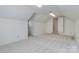 Bonus room with neutral carpet and bonus storage area at 10927 Thornhill Club Dr, Charlotte, NC 28277
