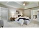 Main bedroom with tray ceiling and walk in closet at 10927 Thornhill Club Dr, Charlotte, NC 28277