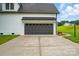 Close-up of a two-car garage, offering ample parking and storage space for vehicles and outdoor equipment at 116 Eve Ash Ln, Mooresville, NC 28115