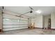Spacious two-car garage features a water heater, an automatic door, and a door to the house at 116 Eve Ash Ln, Mooresville, NC 28115